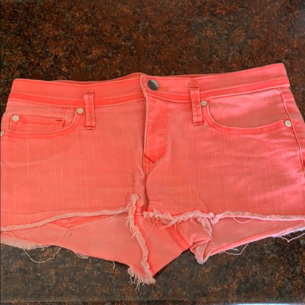 Washed out neon pink roxy shorts